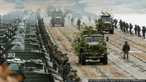 Russian Forces Cross Bridge During Military Exercise